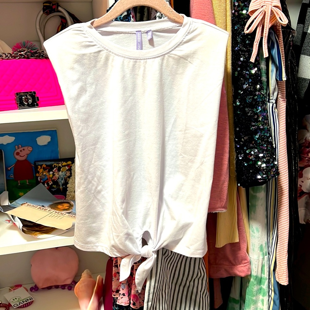 White top with shoulder pads- not worn!